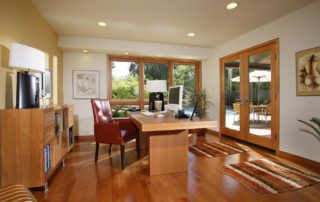 First floor office addition with glass front that would distract even the most dedicated business person. The soffit above the window was used for additional lighting as well as an area for plumbing lines