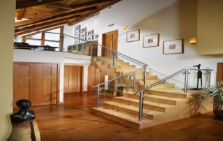 Contemporary brilliance is achieved in this completely remodeled entry- way. Seamless site welded &. Polished stainless steel handrail leads you up the floating stained staircase. Frameless glass allows for an unobstructed view of all the intricate details. The vertical grain fir trim, maple flooring and refinished ceiling illustrate nature’s beauty in this fabulous home.